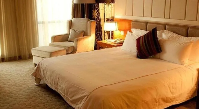 Bed in Ningbo East Shipu Hotel