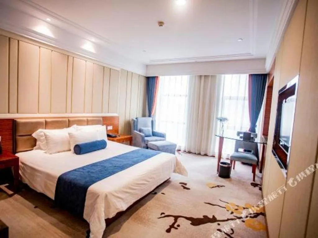 Bed in Ningbo East Shipu Hotel