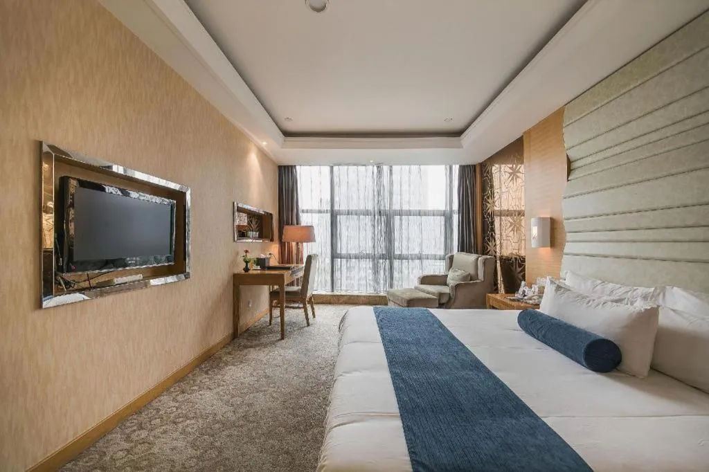 Bed in Ningbo East Shipu Hotel