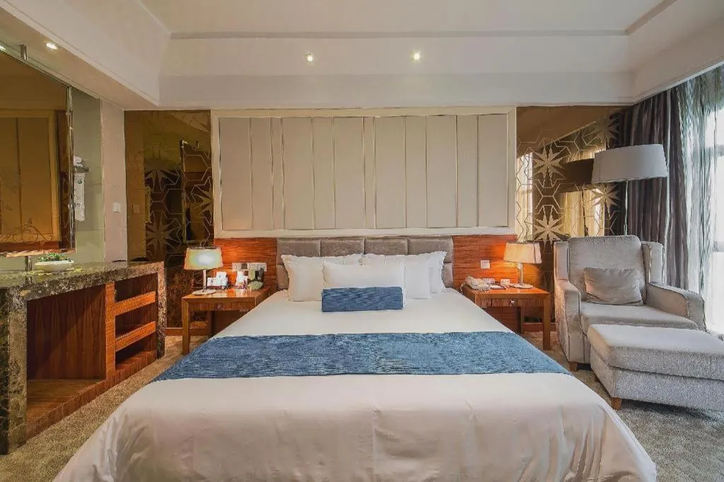 Bed in Ningbo East Shipu Hotel