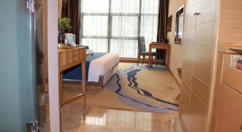 Bed in Ningbo East Shipu Hotel