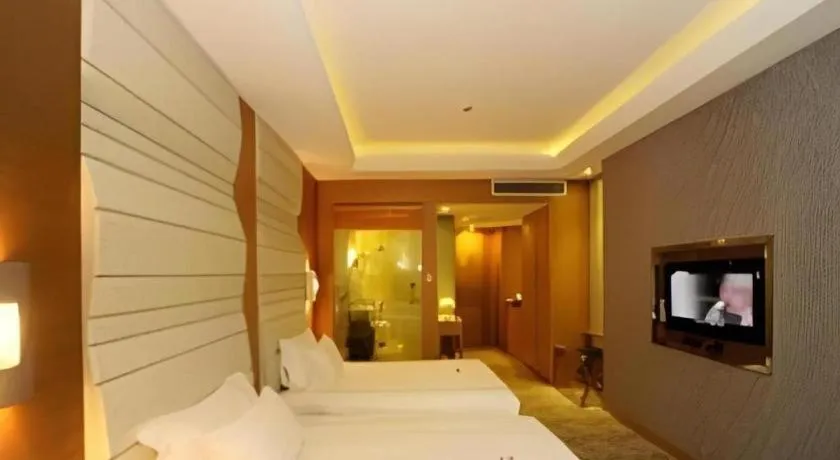 Bed in Ningbo East Shipu Hotel