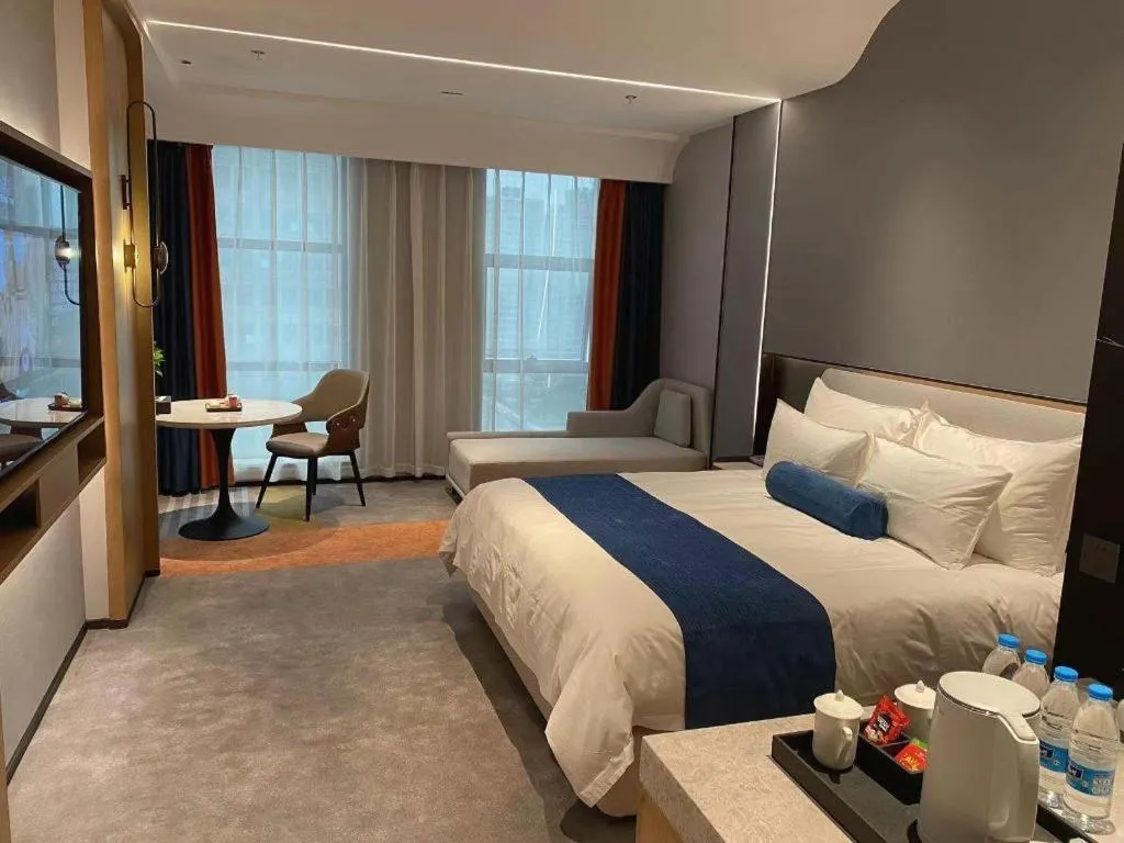 Bed in Ningbo East Shipu Hotel