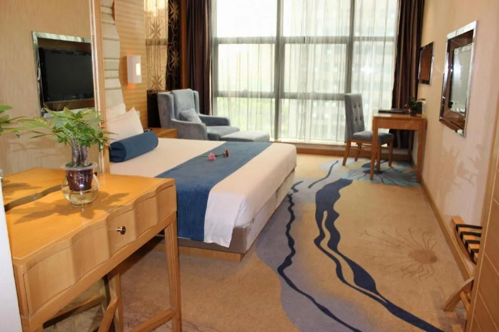 Bed in Ningbo East Shipu Hotel