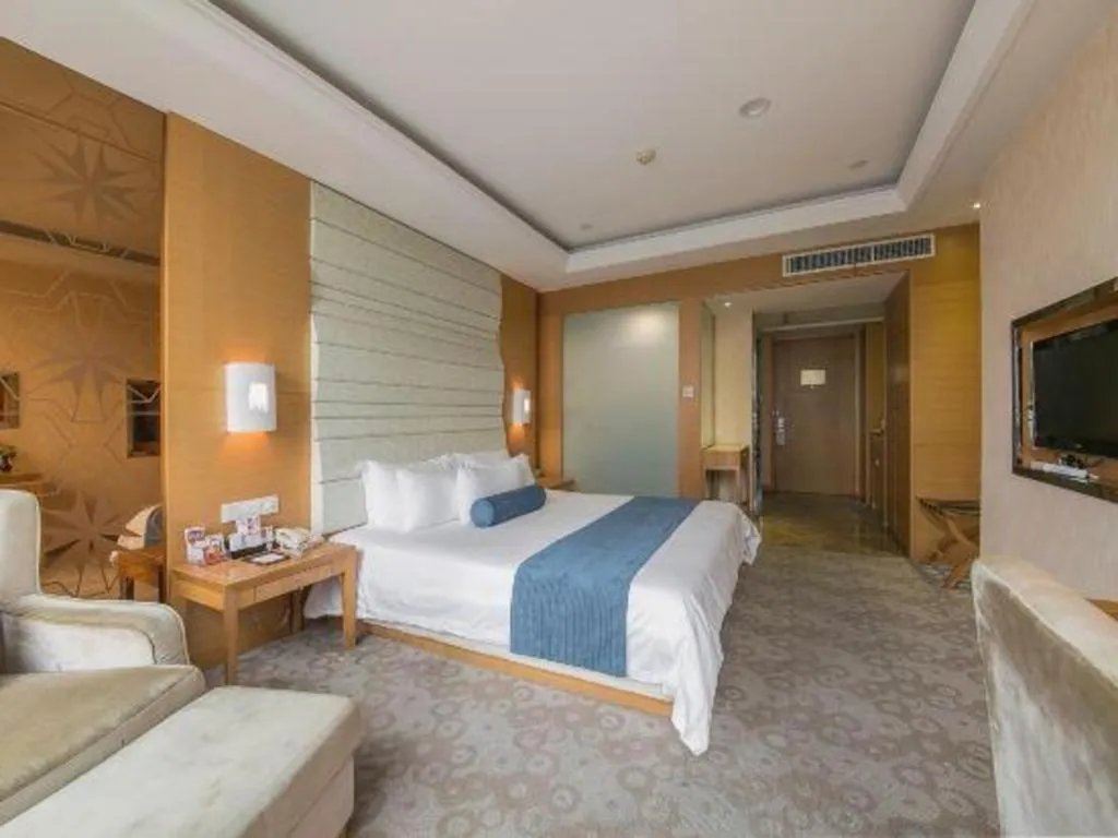 Bed in Ningbo East Shipu Hotel