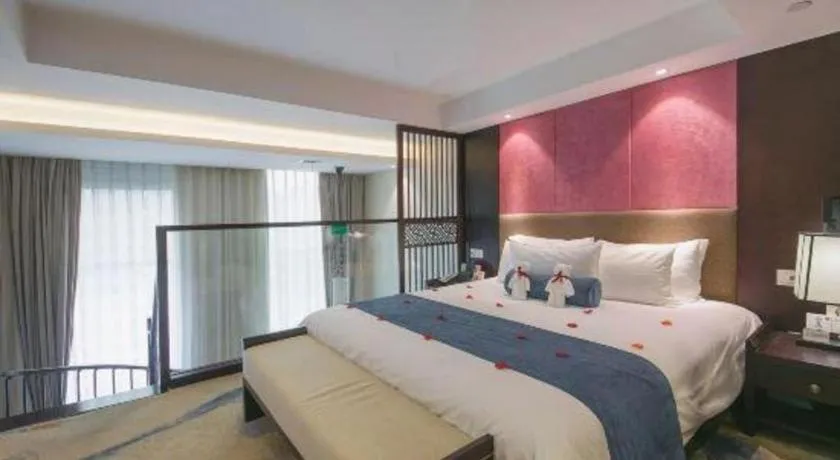 Bed in Ningbo East Shipu Hotel