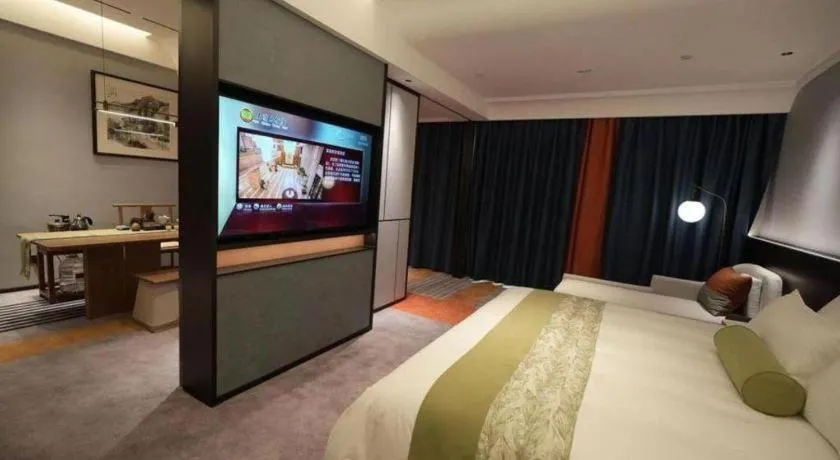 Bed in Ningbo East Shipu Hotel