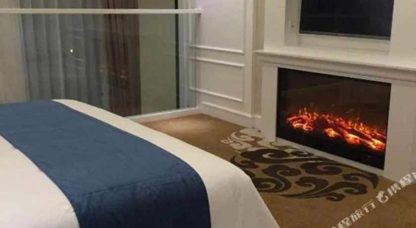 Bed in Ningbo East Shipu Hotel