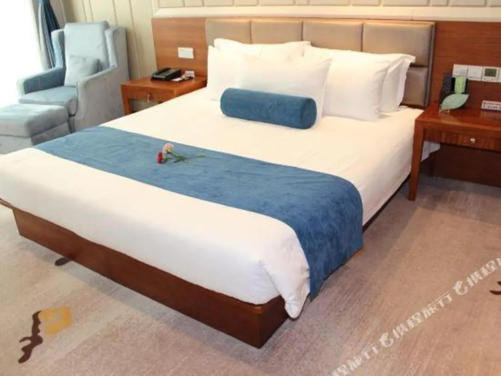 Bed in Ningbo East Shipu Hotel