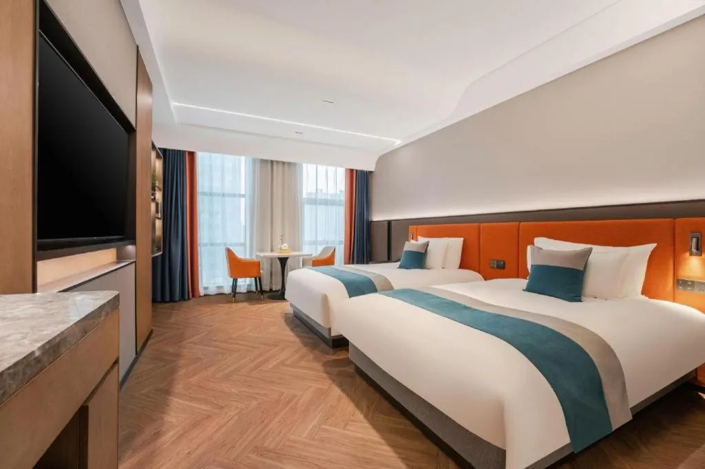 Bed in Ningbo East Shipu Hotel