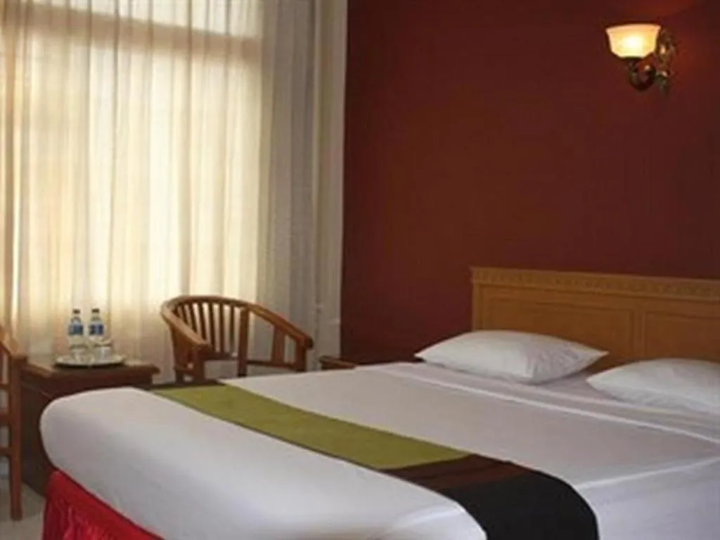 Bed in Lintas Sumatra Hotel