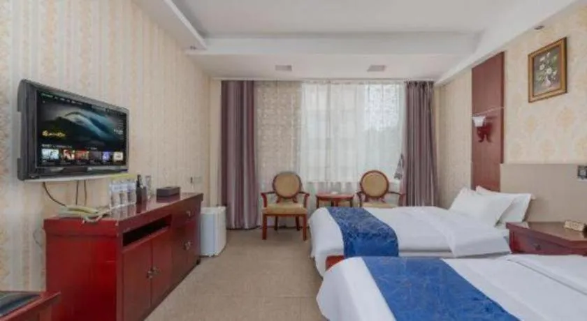 Bed in Weihai Huayu Business Hotel