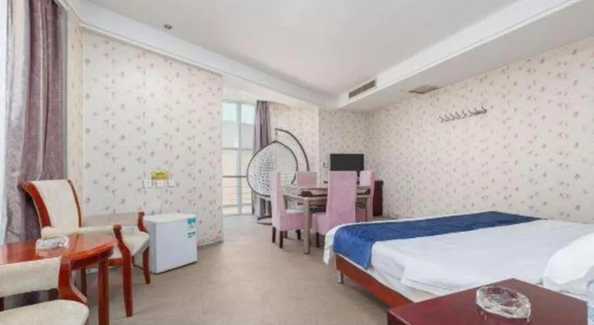 Bed in Weihai Huayu Business Hotel