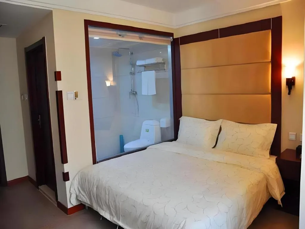 Bed in Weihai Huayu Business Hotel