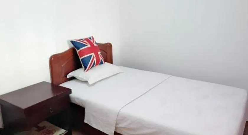 Bed in Weihai Huayu Business Hotel