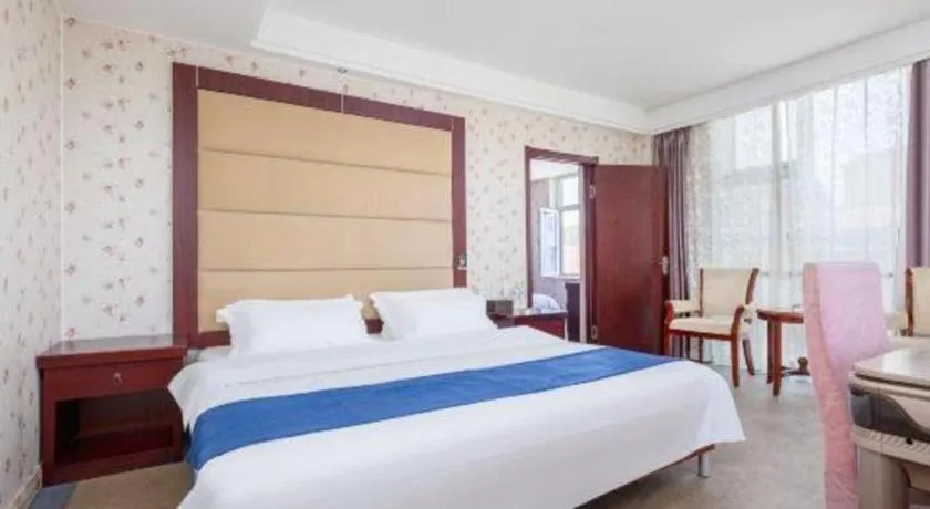 Bed in Weihai Huayu Business Hotel