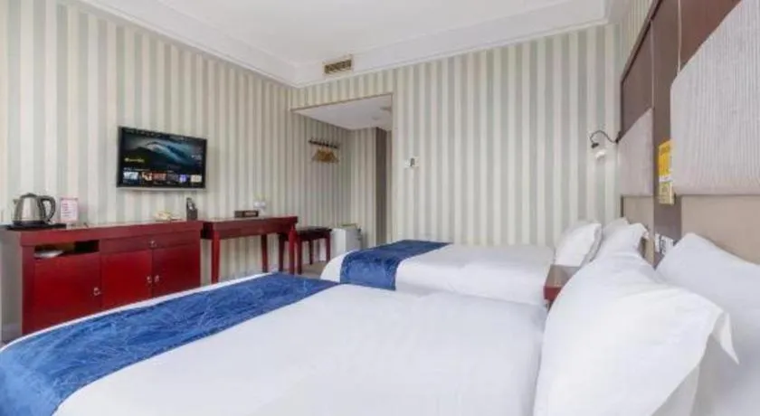 Bed in Weihai Huayu Business Hotel