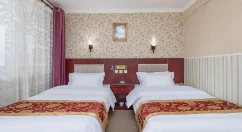 Bed in Weihai Huayu Business Hotel
