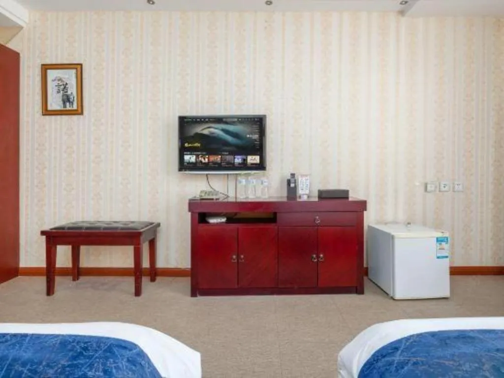 Bed in Weihai Huayu Business Hotel