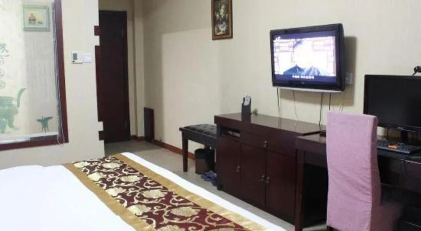 Bed in Weihai Huayu Business Hotel