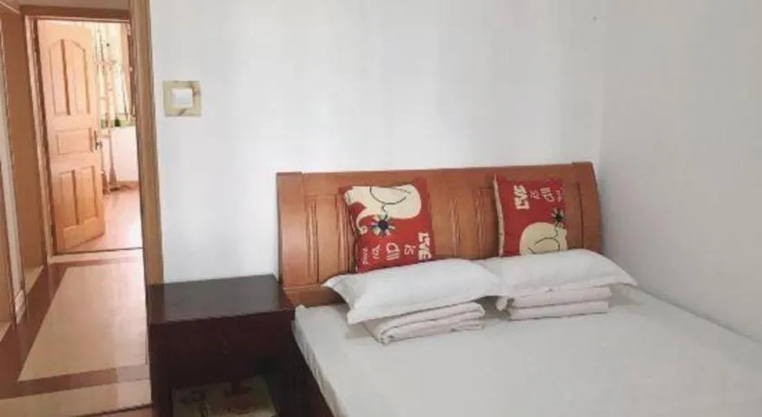 Bed in Weihai Huayu Business Hotel