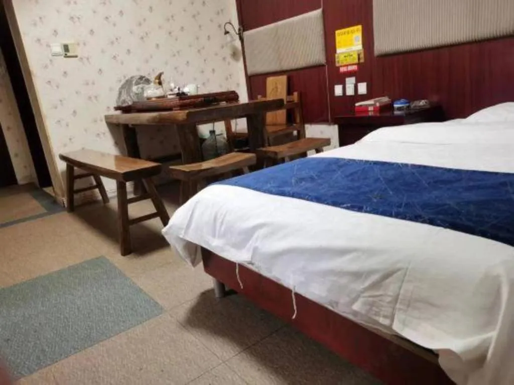 Bed in Weihai Huayu Business Hotel