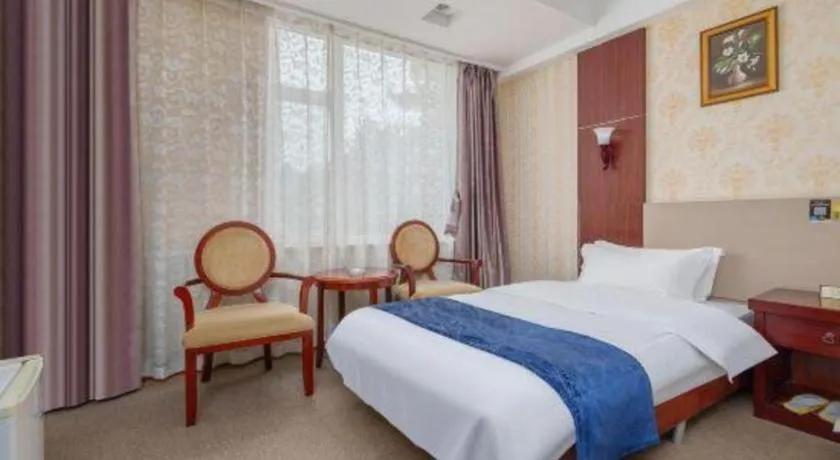 Bed in Weihai Huayu Business Hotel