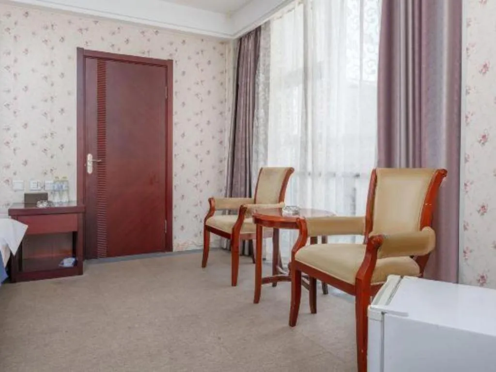 Bed in Weihai Huayu Business Hotel