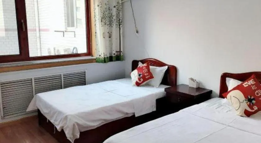 Bed in Weihai Huayu Business Hotel