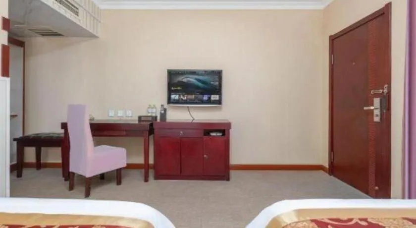 Bed in Weihai Huayu Business Hotel