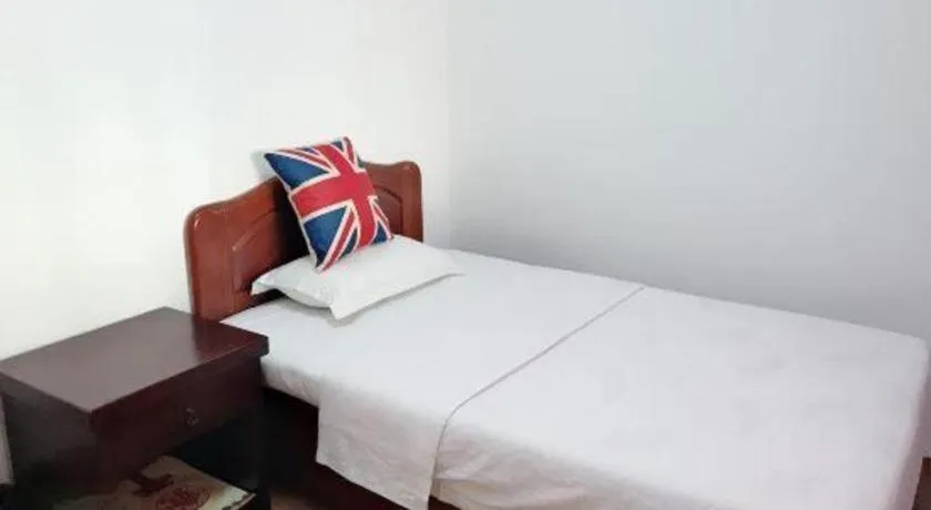 Bed in Weihai Huayu Business Hotel