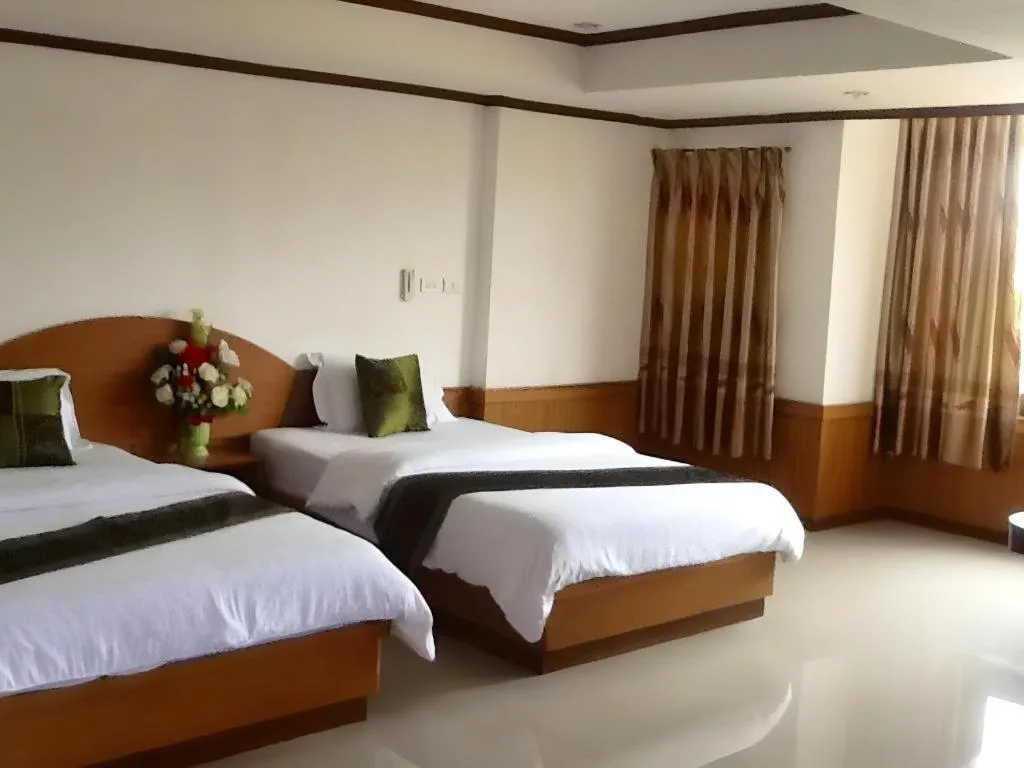 Bed in PC Palace Hotel