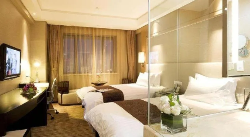 Bed in Huzhou Zhebei Hotel