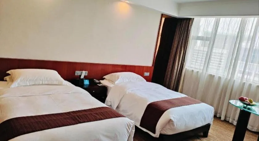 Bed in Centenio International Hotel