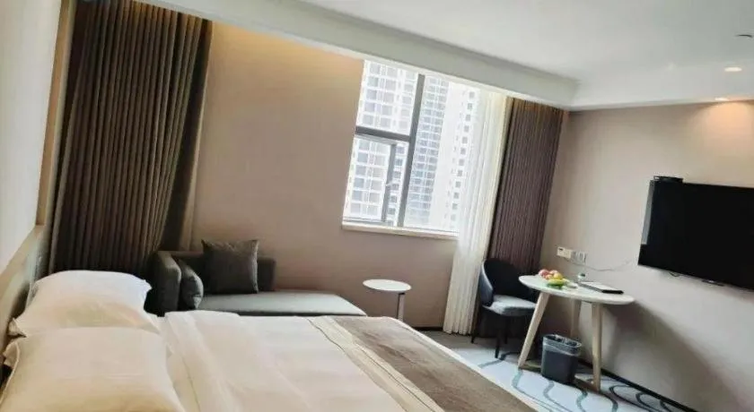 Bed in Centenio International Hotel