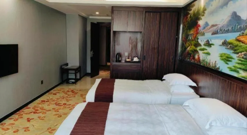 Bed in Centenio International Hotel