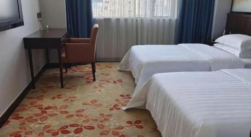 Bed in Centenio International Hotel