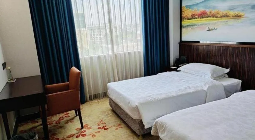 Bed in Centenio International Hotel