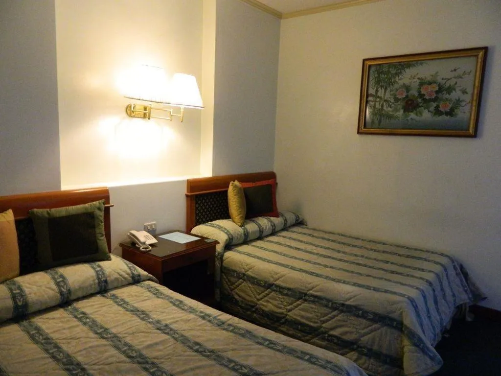 Bed in DJ Paradise Hotel