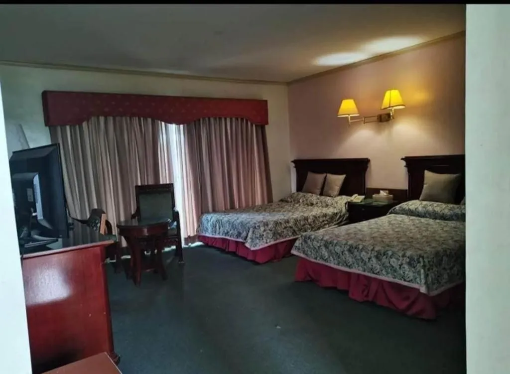 Bed in DJ Paradise Hotel