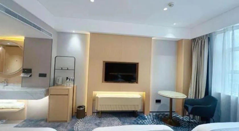 Bed in Kunming Zhong Huang Hotel