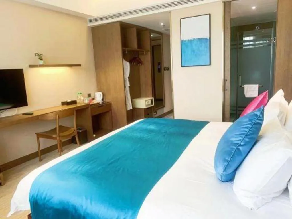 Bed in Kunming Zhong Huang Hotel