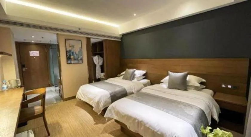 Bed in Kunming Zhong Huang Hotel