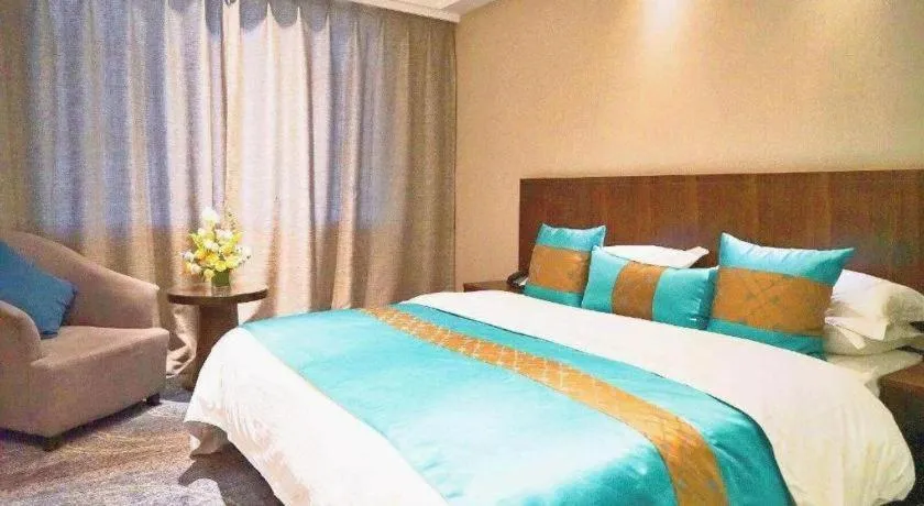 Bed in Kunming Zhong Huang Hotel