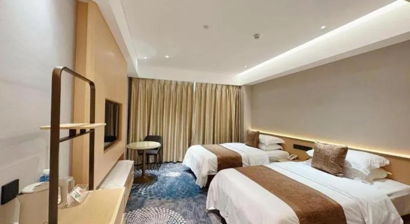 Bed in Kunming Zhong Huang Hotel