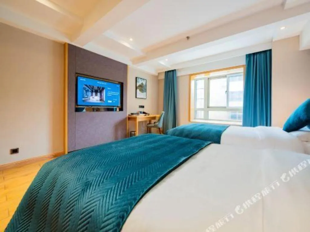 Bed in Xian Katie Eastman Hotel