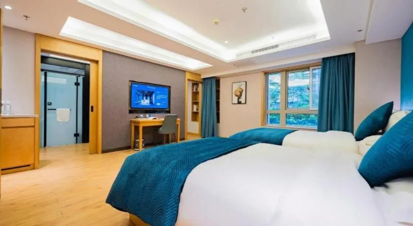 Bed in Xian Katie Eastman Hotel