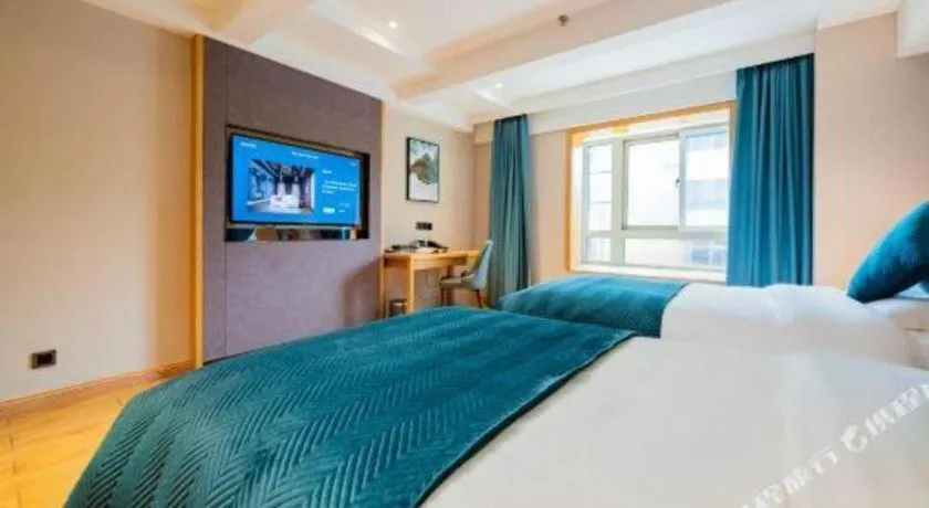 Bed in Xian Katie Eastman Hotel