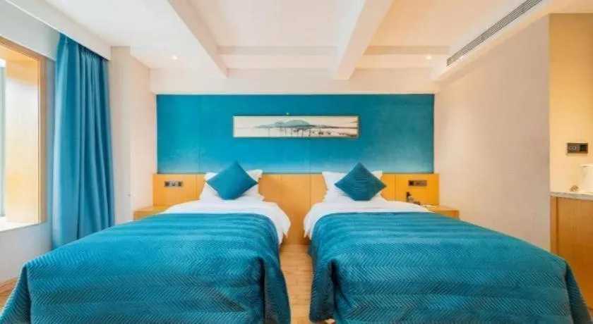 Bed in Xian Katie Eastman Hotel