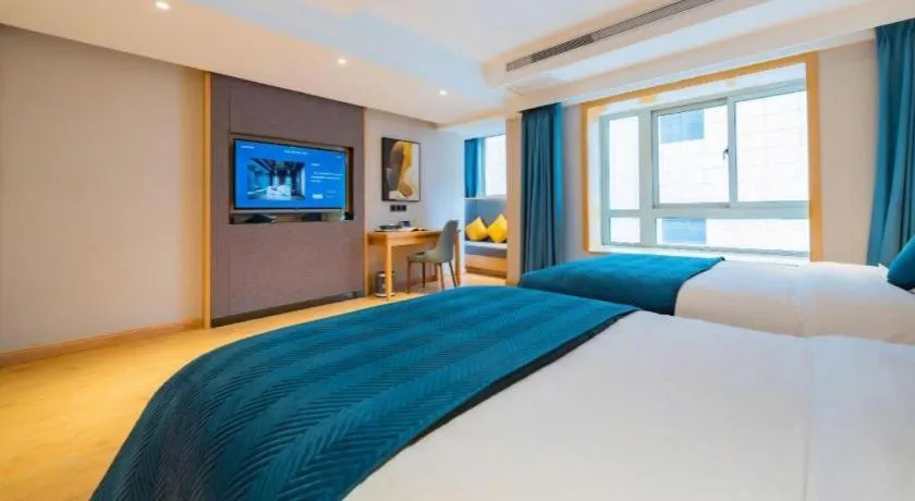 Bed in Xian Katie Eastman Hotel